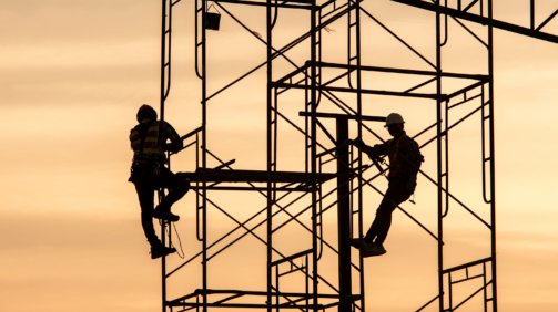 Silhouette Engineers Worker discussion with architects work planing in construction site working on high ground heavy industry and safety concept